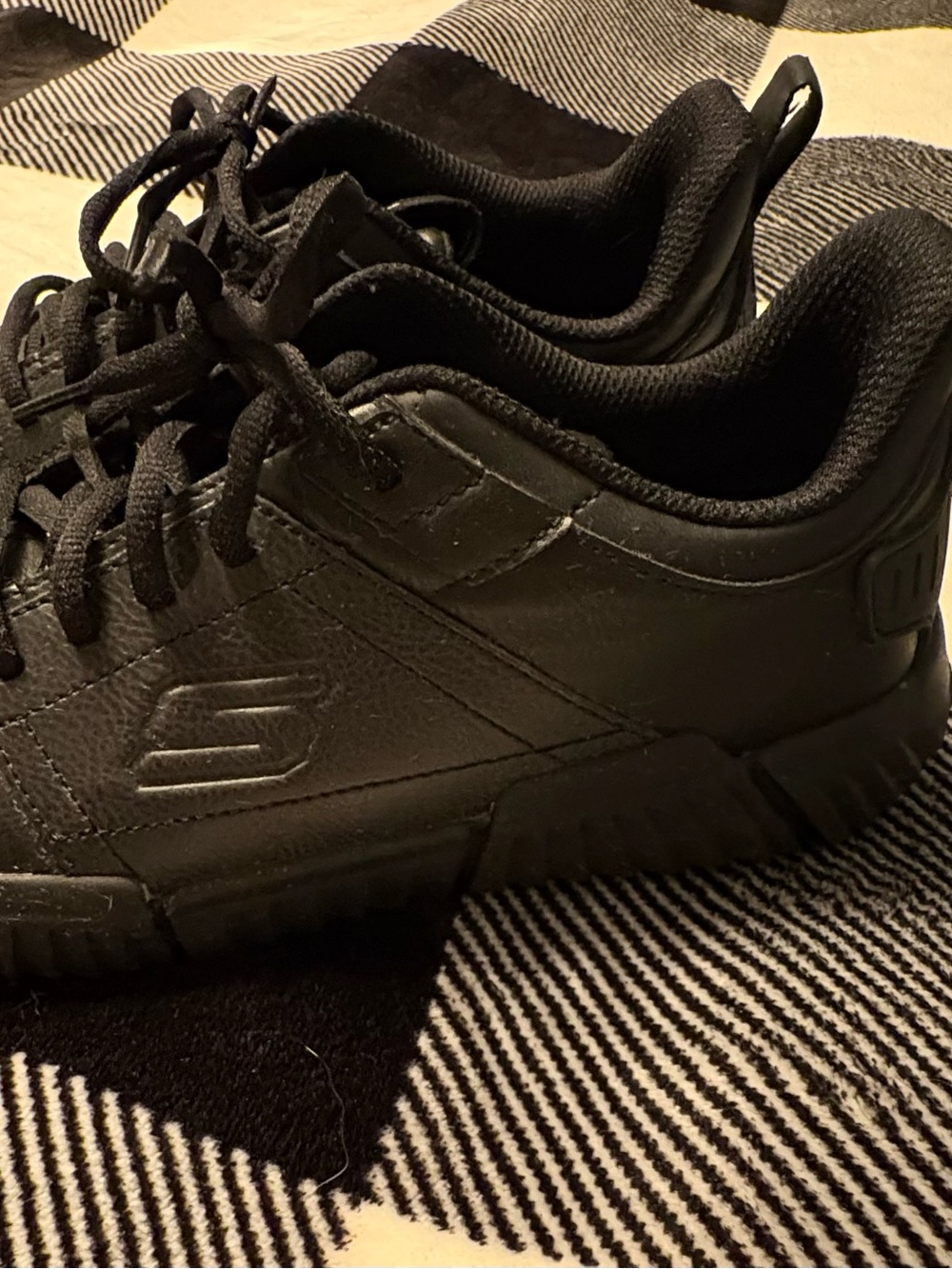 Skechers All-Black Lace-Up Athletic Sneakers